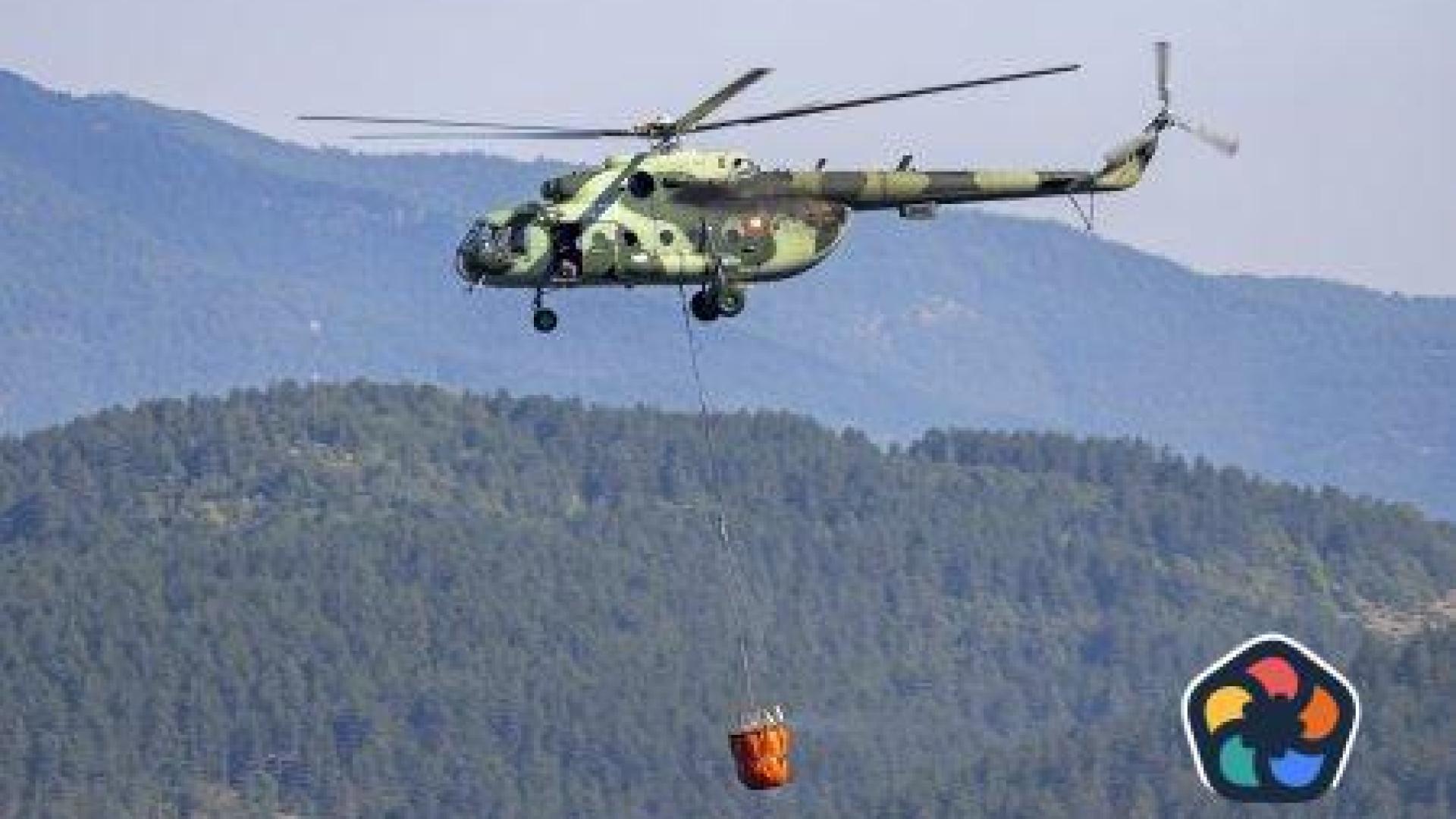 Пожар край Асеновград, военен хеликоптер помага в гасенето